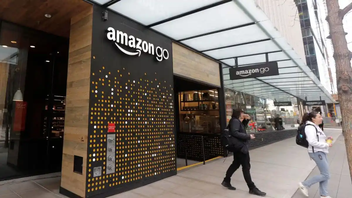 Exterior of an Amazon Go store with the 'Amazon Go' sign displayed, showing a modern, tech-driven retail store.
