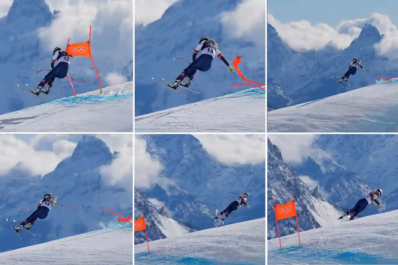 Rescue helicopter airlifts Lindsey Vonn from the mountain following her crash in the Olympic downhill race.