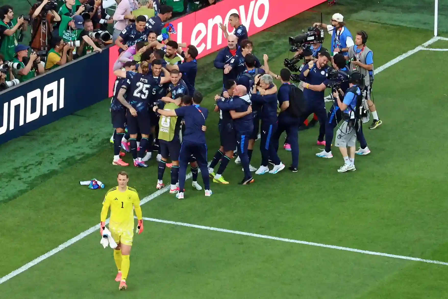 Paraguay celebrating World Cup penalty shootout victory over Germany after dramatic knockout match.